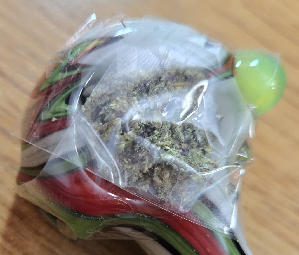 If you'd like some extra protection from crumb spillage, take another piece of tape and stick it crisscross atop the first piece. You should now have pretty good tape coverage around the bowl's entire perimeter. For even better coverage, lay the tape flatter and tighter than usual.