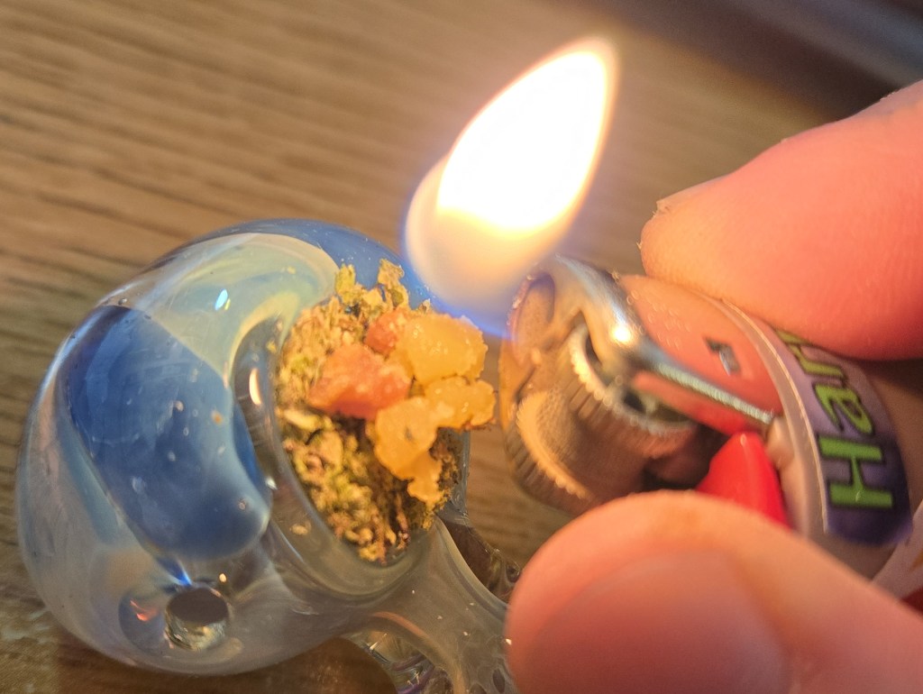 The lighter melts the hash
