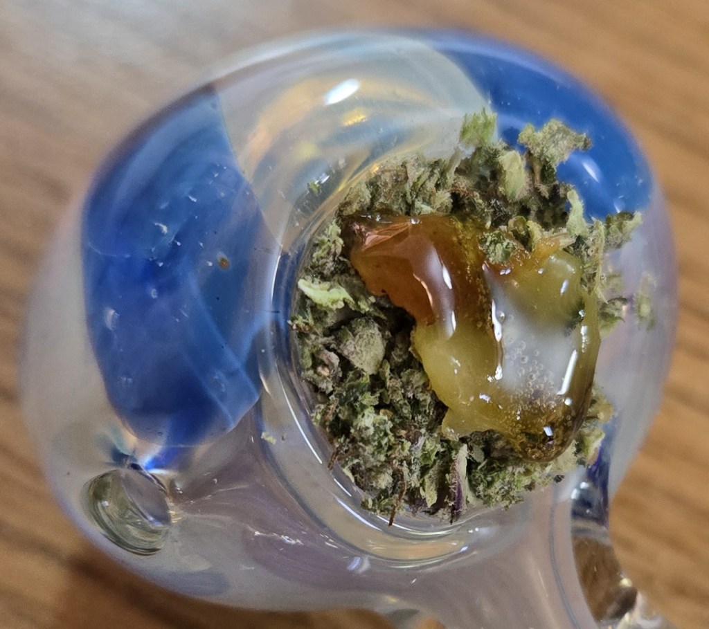 Half-melt hash atop a packed bowl