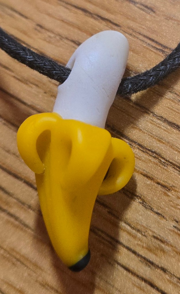 Sand-blasted glass banana pendant by Coyle