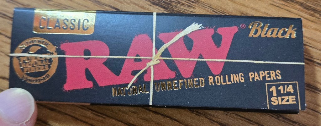 RAW Black rolling paper package