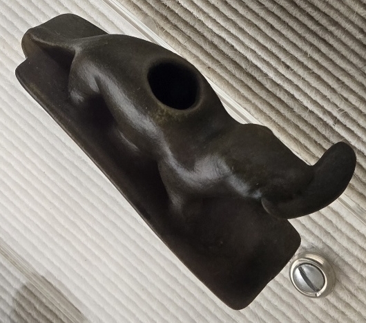 Maybe a panther holding something in its mouth?