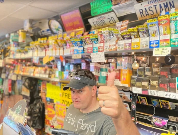 Chris Todd behind the counter